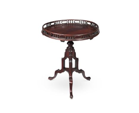 A GEORGE III MAHOGANY TRIPOD TABLE CIRCA 1765 The circular top with pierced gallery75cm high, the top 64cm diameter Condition