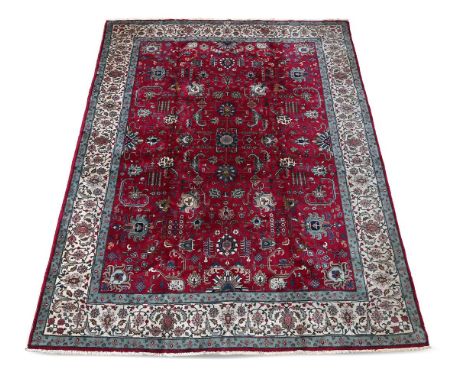 A TABRIZ CARPETSIGNED BY MASTER WEAVER JAVAN AMIR KHIZ approximately 400 x 282cm Condition Report: Some wear to carpet overal