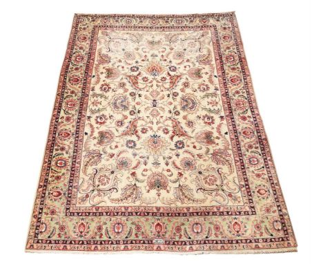A TABRIZ CARPETSIGNED BY MASTER WEAVER RABIEEI LALEHapproximately 403 x 288cmCondition Report: Carpet with  wear overall resu