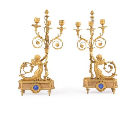 A PAIR OF LOUIS XVI STYLE ORMOLU THREE LIGHT CANDELABRA BY ALFRED-EMMANUEL-LOUIS BEURDELEY, LATE 19TH CENTURY Each with centr