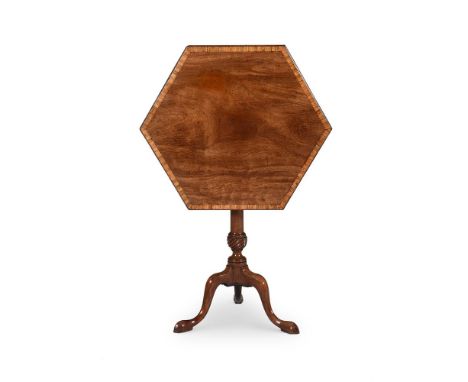 A GEORGE III GUADELOUPE MAHOGANY HEXAGONAL TRIPOD TABLEPOSSIBLY BY THOMAS CHIPPENDALE, CIRCA 1765The finely figured and cross