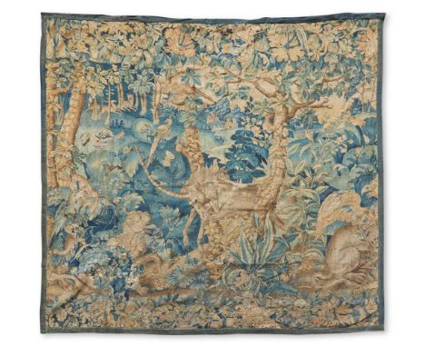 A FLEMISH TAPESTRY FRAGMENT WOVEN WITH A UNICORN SECOND HALF 17TH CENTURYWith central depiction of lion and unicorn, part sec