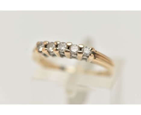 A 9CT GOLD DIAMOND FIVE STONE RING, set with a row of five small, round brilliant cut diamonds, shared claw setting, stamped 