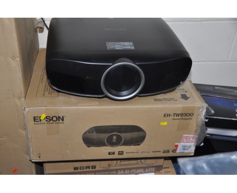 AN EPSON EH-TW9300 HOME CINEMA PROJECTOR in original packaging with remote  and power cable along with a Panasonic UB900 DVD 