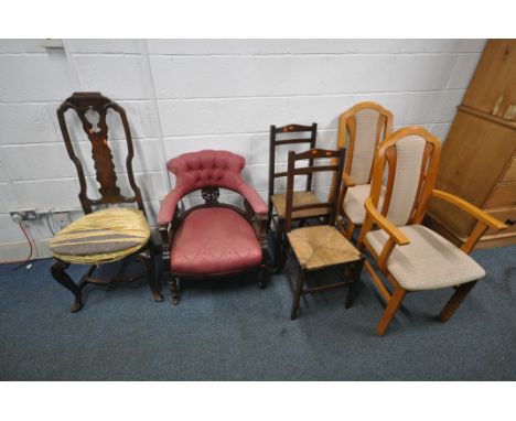 A VARIETY OF PERIOD CHAIRS, to include a Victorian tub chair, with ruby red and foliate upholstery, an oak chair, a pair of r