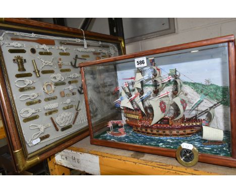 A GROUP OF NAUTICAL THEMED ITEMS, comprising a model of 'The Mary Rose' in a wooden framed glazed case, the White cliffs of D