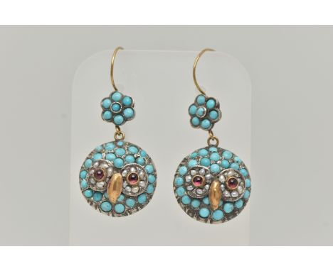 A PAIR OF VICTORIAN YELLOW AND WHITE METAL OWL DROP EARRINGS, each drop earring of a circular form, depicting the face of an 