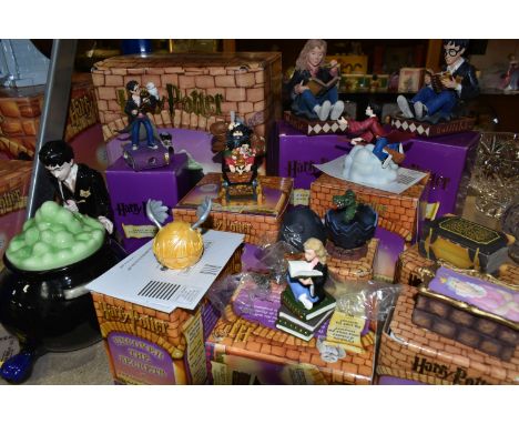 A GROUP OF BOXED ENESCO HARRY POTTER ITEMS, comprising a Harry Potter cookie jar (glasses loose), Harry Potter and Hermione G