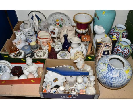 THREE BOXES AND LOOSE ORNAMENTS, three porcelain pin dolls, seven stone 'eggs', a Wedgwood 'Peter Rabbit' dinner plate, Orien