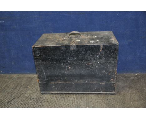 A VINTAGE WOODEN ENGINEERS TOOLCHEST with four graduated drawer concealed by a lift off front panel and containing tools and 