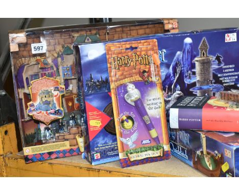 A COLLECTION OF HARRY POTTER RELATED MEMORABILIA AND COLLECTABLES, to include boxed Noble Collection wand with illuminating t