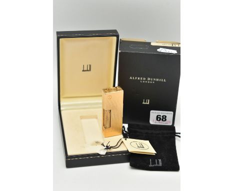 A CASED 'DUNHILL' LIGHTER, the rectangular lighter with engine turned case, base stamped 'Dunhill 36931 Swiss Made, AD YN,' a