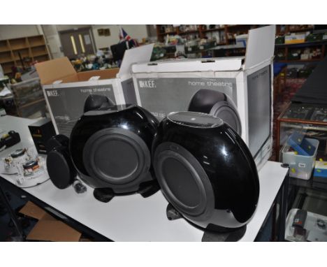 A PAIR OF KEF HTB2SE POWERED SUBS in original packaging, a pair of similar KEF satellite speakers, a pair of Ghost ceiling sp