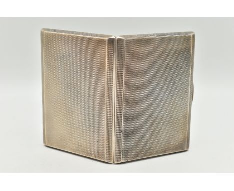 A SILVER CIGRETTE CASE, rectangular form with an engine turned pattern, push button clasp, fitted with a yellow elasticated s