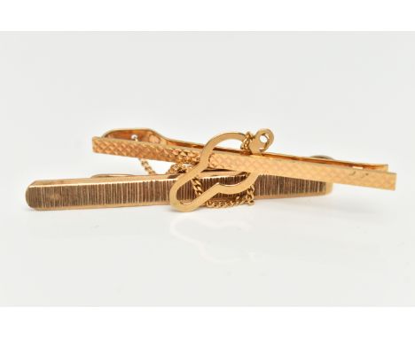 TWO 9CT GOLD TIE CLIPS, the first with a textured pattern, hallmarked 9ct Birmingham, length 50mm, the second with textured p