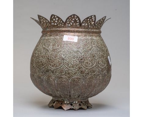 An antique Indian / Chinese planter pot in heavily chase worked and embossed copper in a lotus flower design with footed base