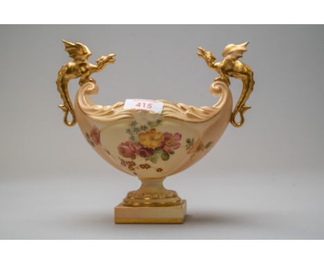 A Royal Worcester dragon boat or fruit bowl having a footed base with hand decorated floral work panels, and twin dragon styl