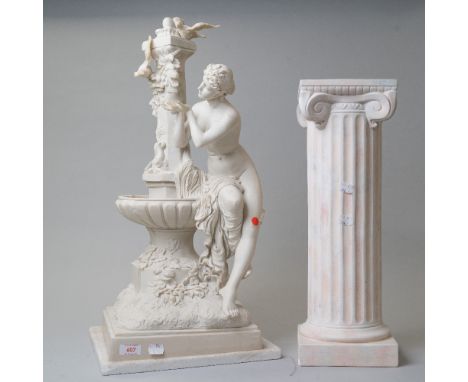 A classical styled figure base of a semi nude bather at a water fountain cast in resin standing 67cm tall with a ceramic Gree
