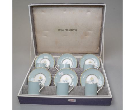 A cased six serving coffee set by Royal Worcester having the Woodland design