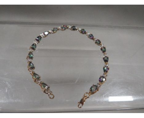 A 9ct gold mystic topaz and gemset tennis bracelet stamped 375, approx L 18.5 cm, overall weight approx. 7.19 g