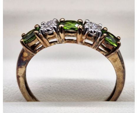 9ct rose gold ring set with diamond clusters and oval green tourmaline gem stones. [Ring size Q] [2.09Grams] 