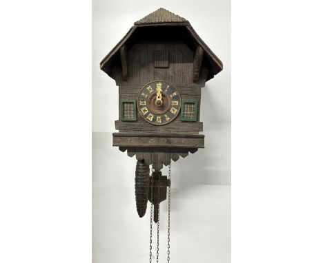 Early 20th century German Cuckoo clock possibly by A. Jagemann, Munchen. Having double bellow design. Comes  with weights and