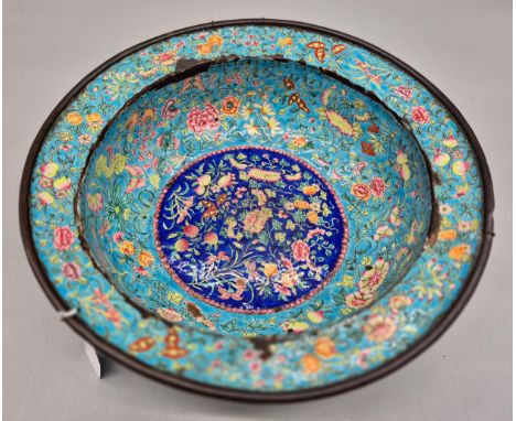 18th century Chinese Canton enamel washbowl; detailed with various floral design. [As found] [12cm x42cm diameter] 