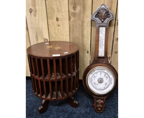 Mahogany brass top inlaid revolving stand together with Aneroid barometer 