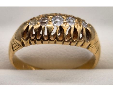 Birmingham 18ct yellow gold and diamond set ring. Set with five round cut diamonds. [3.88grams] [Ring size L] 