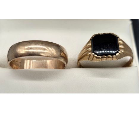 9ct yellow gold wedding band and 9ct yellow gold and onyx [6.93Grams] [Band- Ring size V] [Signet- T] 