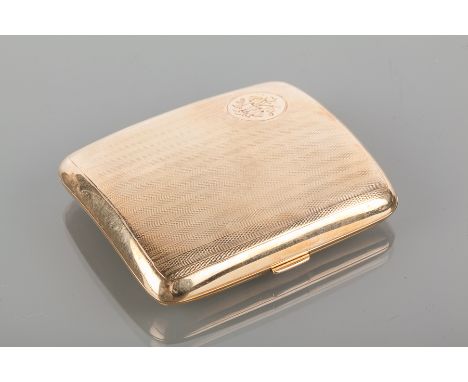 NINE CARAT GOLD CIGARETTE CASE
with engine turned decoration and engraved monogram, 86.9g