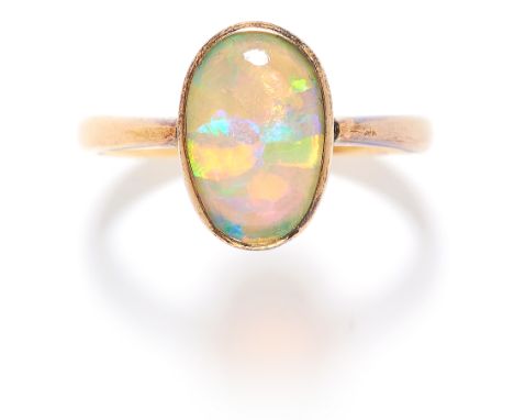 OPAL DRESS RING in 18ct yellow gold, set with a cabochon harlequin black opal, marked indistinctly, size J / 4.5, 2.0g.