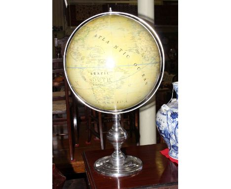 Large table top globe on chrome stand