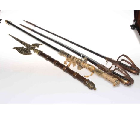 Pair of swords and scabbards, Samurai sword and brass and wood axe and two others