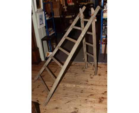 Vintage wooden extending ladder with eleven rungs