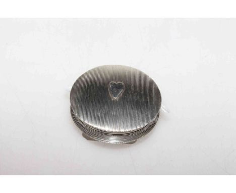 Dutch silver circular snuff box, with engine turned ground centred by a heart motif, 5cm