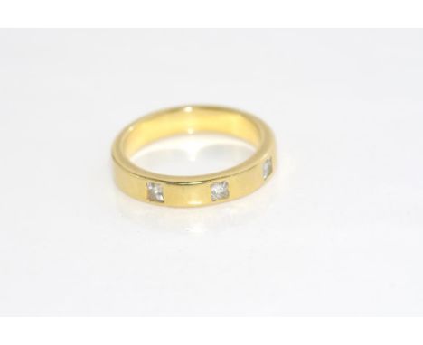 18ct yellow gold and three diamond band weight: approx 4.53 grams, size: K/5