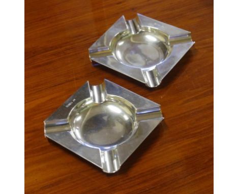 Two sterling silver ashtrays hallmarked Chester 1920, by Charles Cooke, 114g approx.