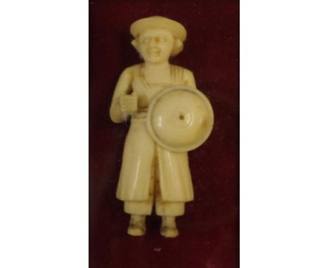 Vintage Oriental carved ivory figure with shield, circa 1920s, in gilt frame, ex Edith Elizabeth Antiques, 5.5cm high approx.