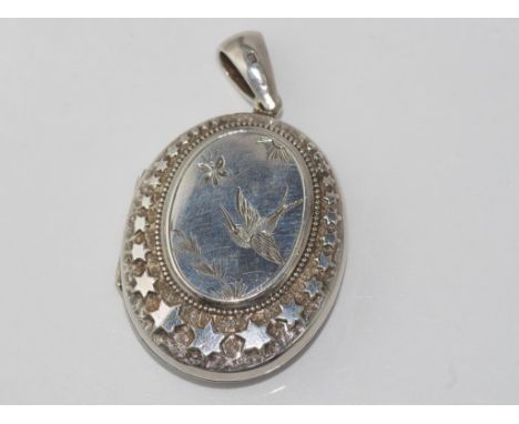 Hallmarked sterling silver bird & star locket hallmarked Birmingham 1880