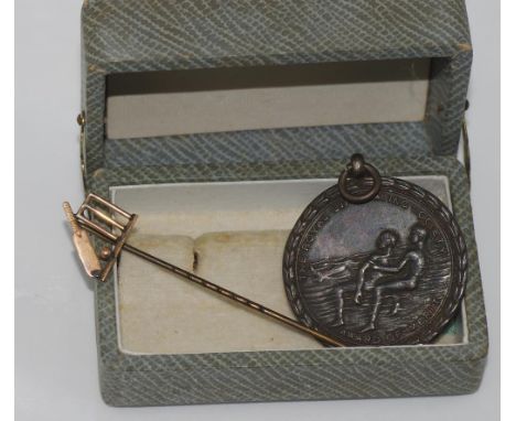 9ct gold cricket tie pin with a silver life saving medal 1936
