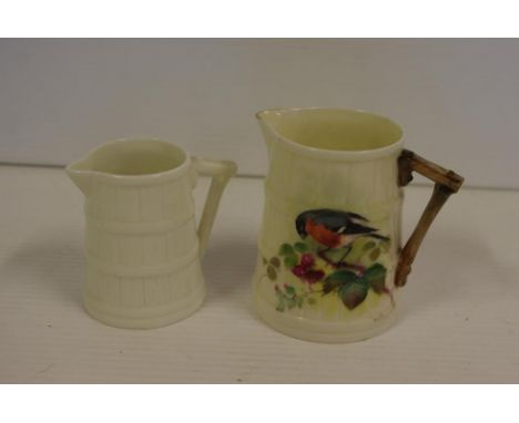 Royal Worcester hand painted jug decorated with Bull Finch signed Powell, 8 cm high, circa 1940, together with another