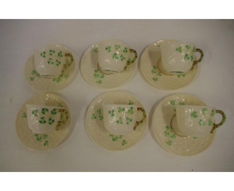 Set of six Belleek coffee cups & saucers