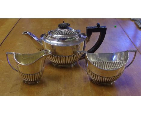 Late Victorian Bachelor stg silver tea service comprising of a teapot, sugar bowl and creamer, hallmarked Sheffield 1897