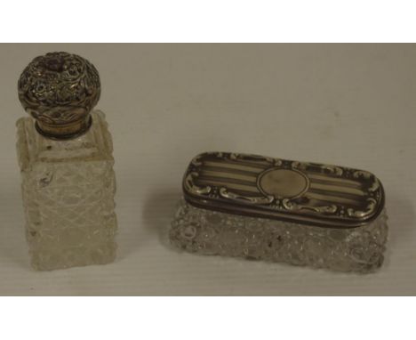 Two sterling silver topped  jars with various English hallmarks and hobnail crystal bases