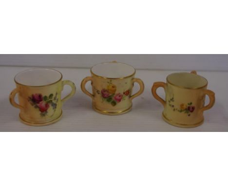 Three Royal Worcester miniature loving cups pattern: blush ivory with floral decoration, H4cm approx (tallest)