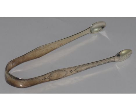 George III sterling silver bright sugar tongs hallmarked London 1805, maker GW