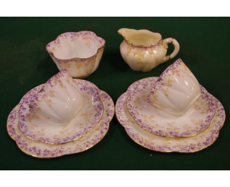 Quantity of Wileman (Shelley) pieces comprising 2 trios, sugar bowl (a/f) & a creamer