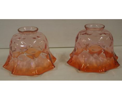 Two vintage cranberry glass light shades