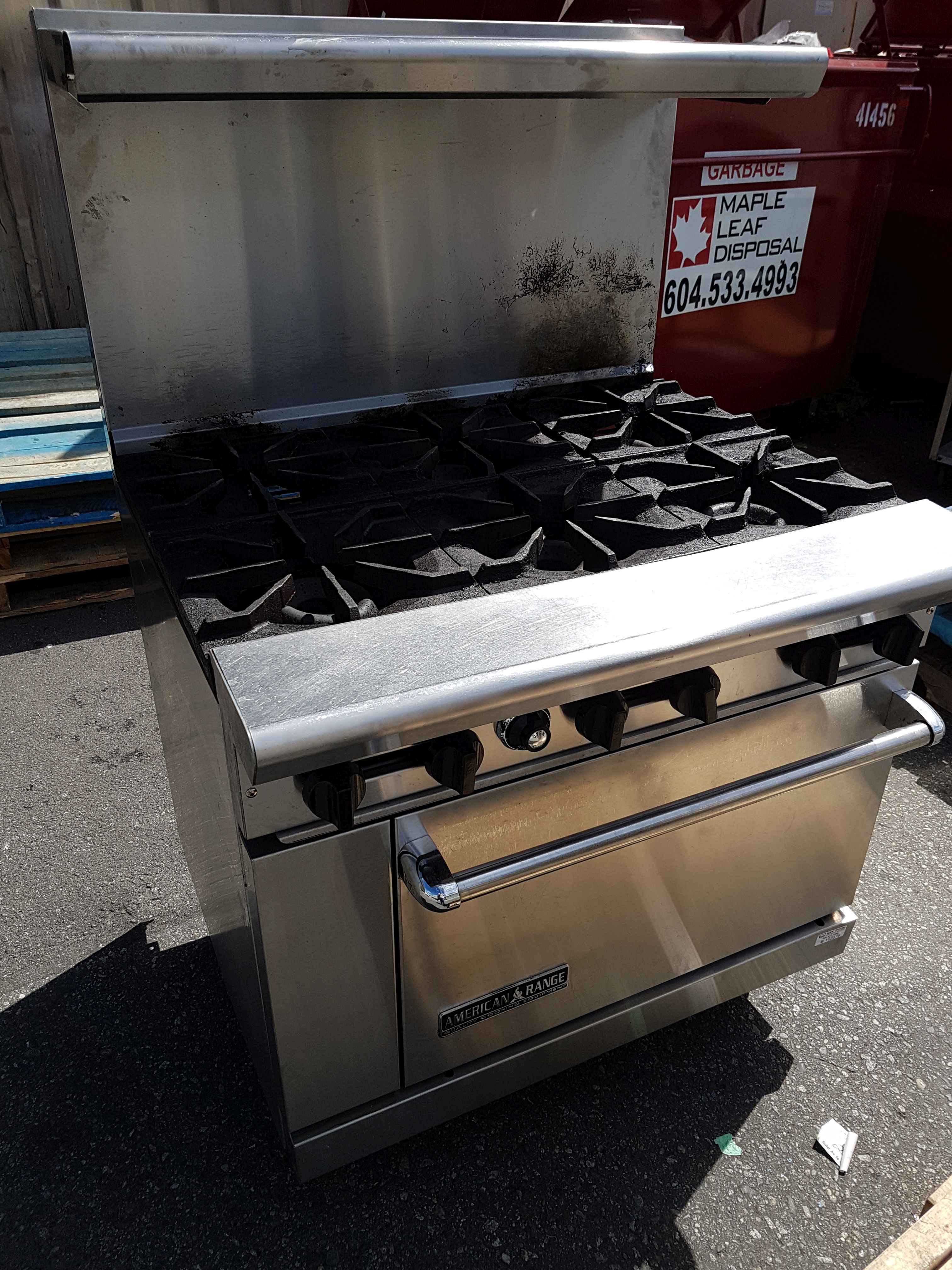 American Range 6 Burner Range with Oven, Notes Used,Location